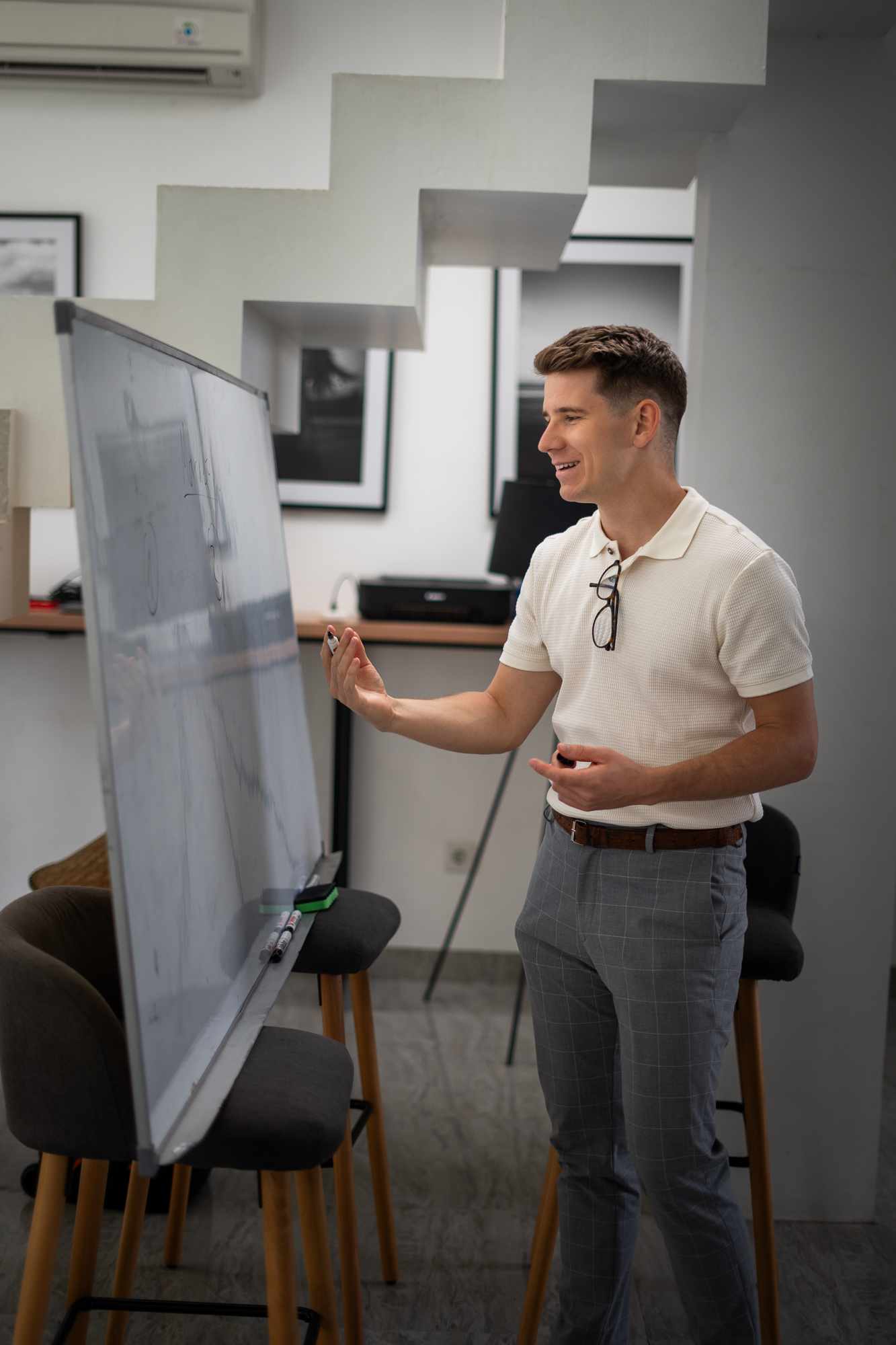 Man explaining on whiteboard